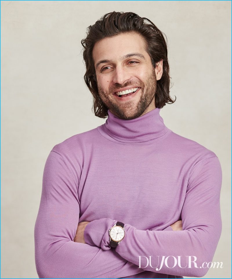 Alexander DiPersia wears turtleneck Versace and G-Timeless Automatic watch Gucci.