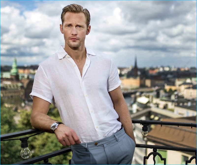 Alexander Skarsgård embraces summer style in a linen short sleeve shirt from Vince.