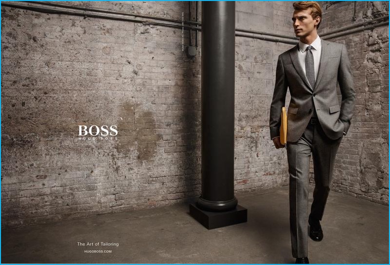 Clément Chabernaud dons a grey suit for BOSS Hugo Boss' fall-winter 2016 campaign.