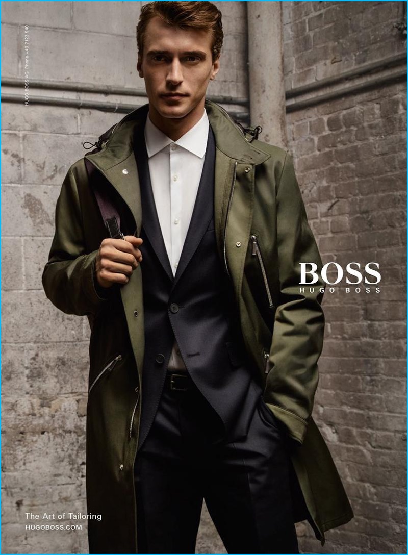 Clément Chabernaud dons a sporty coat for BOSS Hugo Boss' fall-winter 2016 campaign.