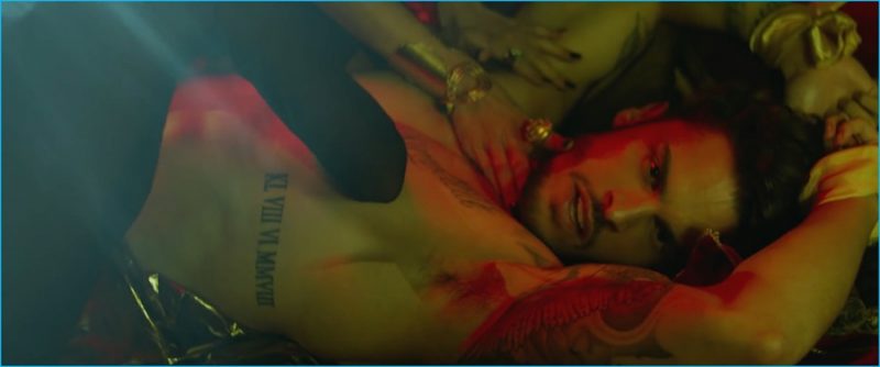 Baptiste Giabiconi is tied up for a ménage à trois in his Love to Love You music video.