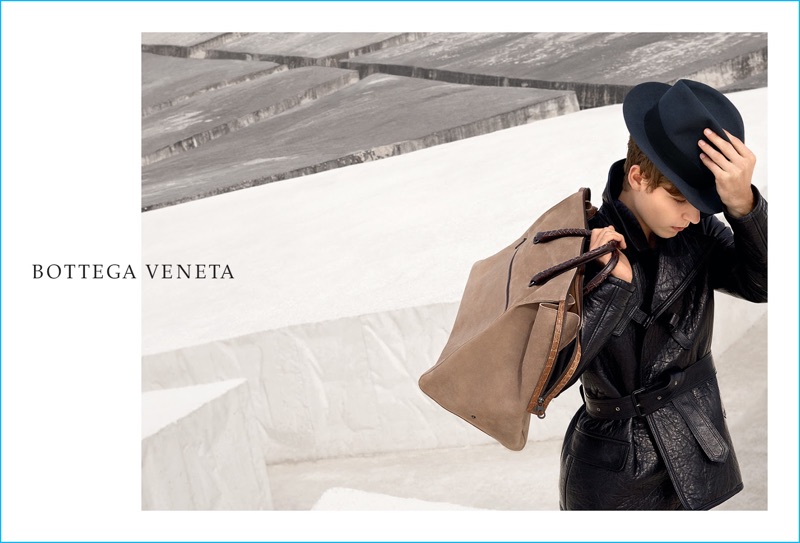 Simon Fitskie photographed against the backdrop of the Cretto di Burri for Bottega Veneta's fall-winter 2016 campaign.
