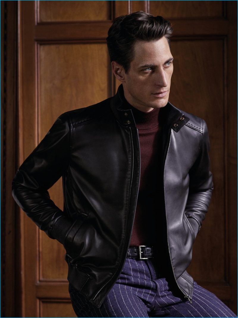 Axel Hermann sports a nappa leather jacket with pinstripe trousers from Corneliani's fall-winter 2016 collection.