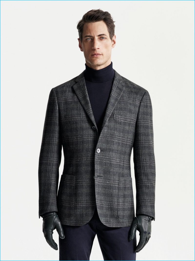 Axel Hermann is a sleek vision in a wool blazer and cashmere turtleneck from Corneliani's fall-winter 2016 collection.