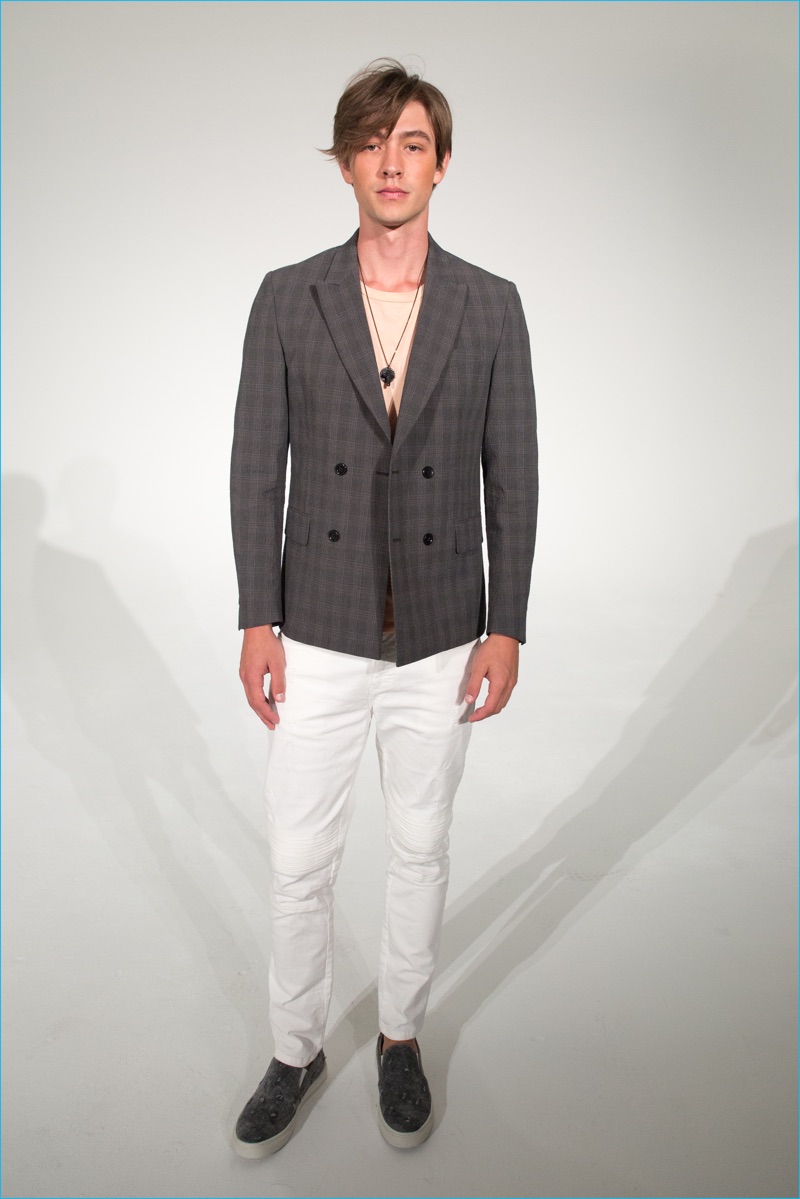 Classics such as the double-breasted jacket come together with casual statements like white jeans for David Naman's spring-summer 2017 collection.