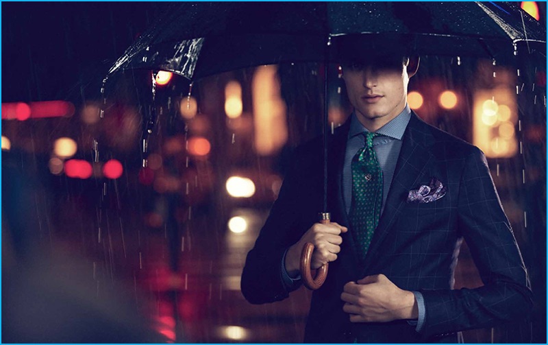Bastiaan Van Gaalen is captured in the rain, accessorized with Eton's silk tie and pocket square.