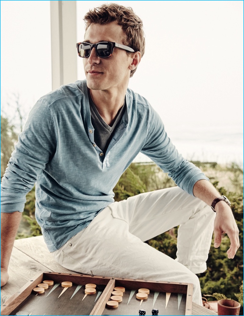 Rocking the brand's stylish sunglasses, Clément Chabernaud relaxes in one of J.Crew's made in LA, garment-dyed henley shirts.