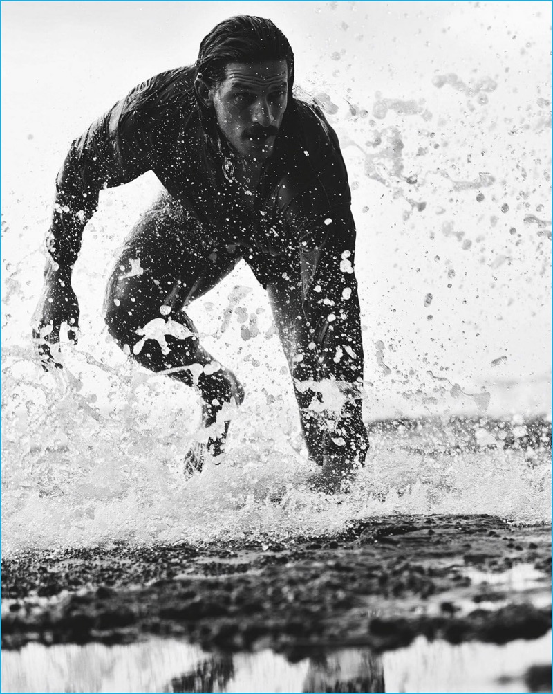 Photographed for GQ Australia, Jarrod Scott hits the surf at Garie Beach.