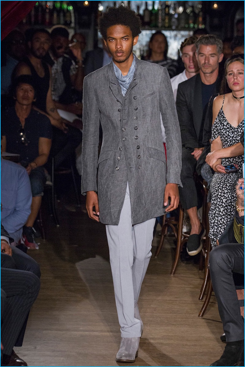 John Varvatos channels an old-world charm with a double-breasted coat for spring-summer 2017.