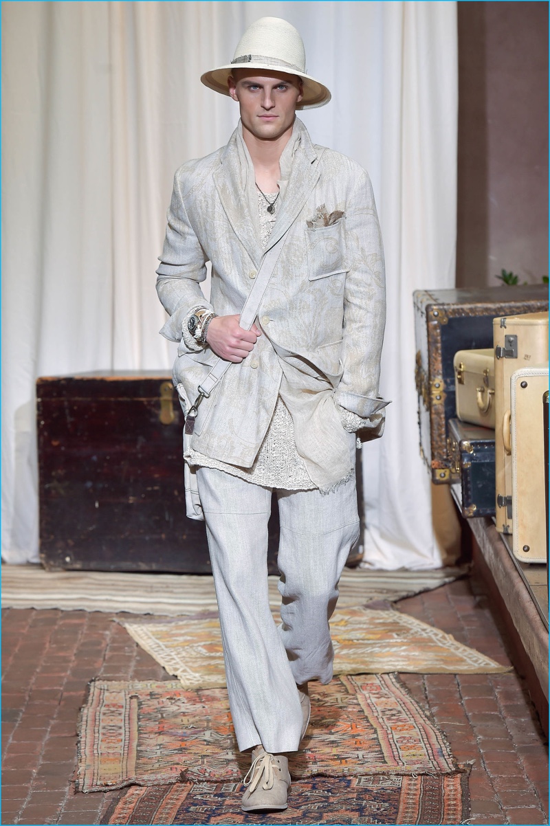 Reid Prebenda dons a jacquard printed blazer with linen trousers as he walks for Joseph Abboud's spring-summer 2017 show.