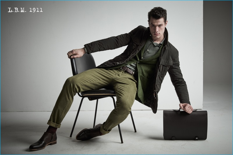 Andy Walters dons green tailored fashions from L.B.M. 1911's fall-winter 2016 collection.