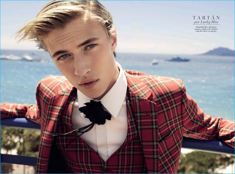 Lucky Blue Smith is front and center in a red tartan suit from Gucci.
