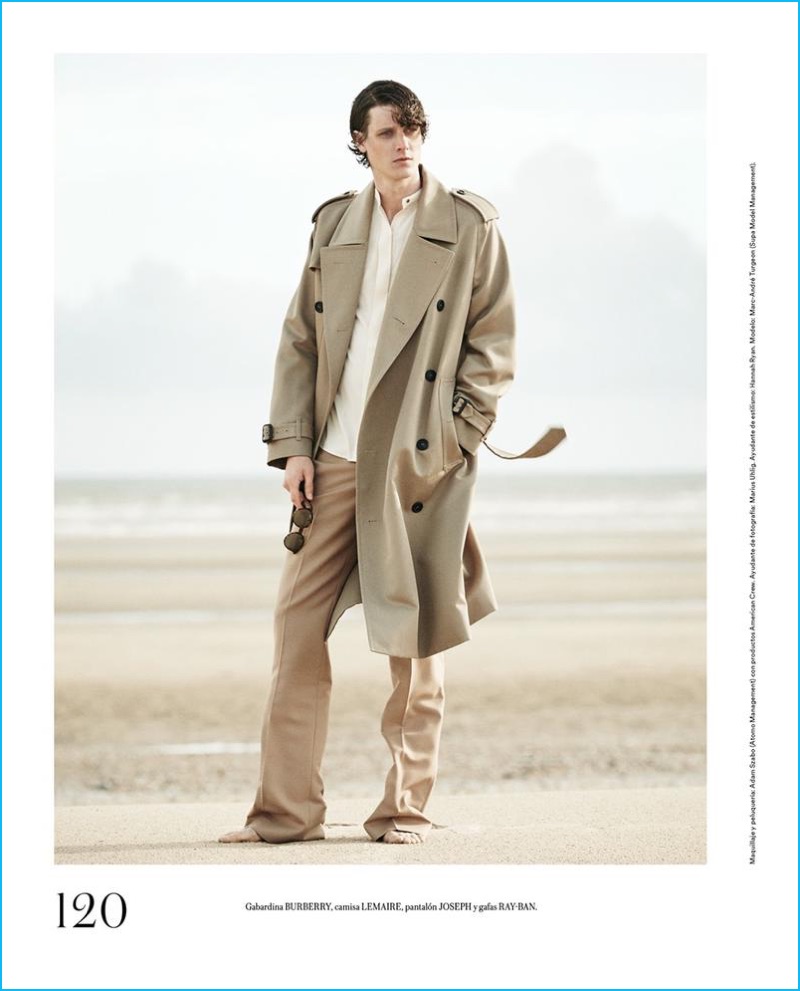 Marc-André Turgeon dons an oversized trench coat from Burberry.
