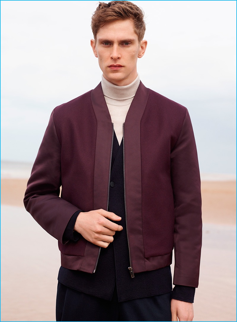 Mathias Lauridsen sports a chic bomber jacket for COS' fall-winter 2016 campaign.