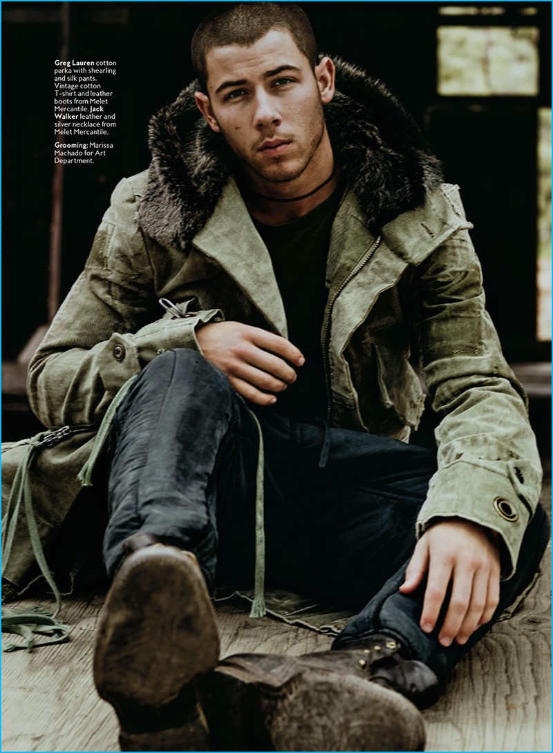 Nick Jonas embraces a rugged edge in a Greg Lauren parka and pants, paired with vintage leather boots.