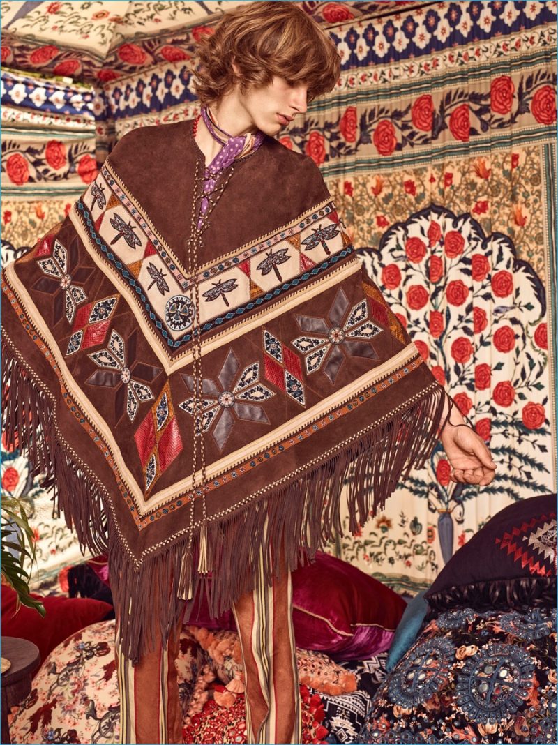 Roberto Cavalli enjoys a Bohemian style moment with a fringe suede poncho with Navajo inspired embroideries. » Roberto Cavalli Perfects 70s Boho Roberto Cavalli enjoys a Bohemian style moment with a fringe suede poncho with Navajo inspired embroideries.