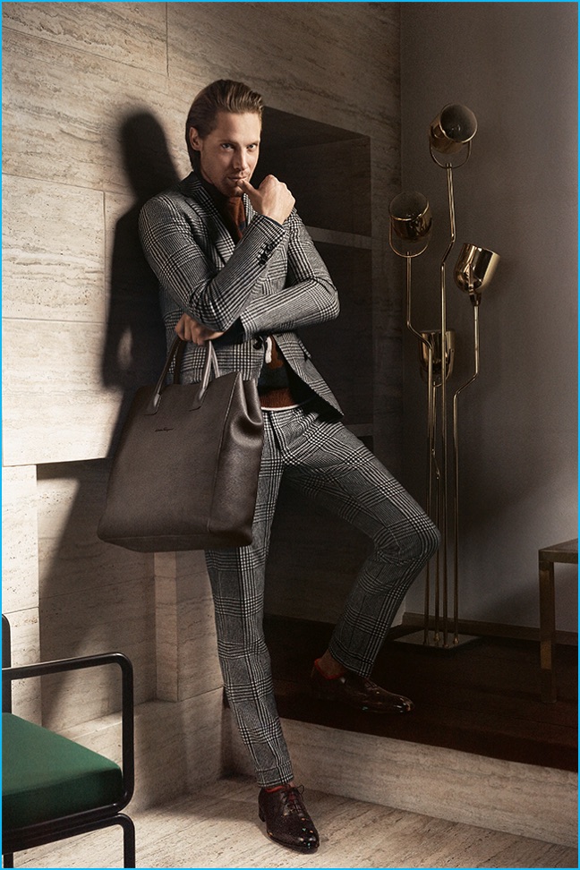 James Rousseau dons fine suiting for Salvatore Ferragamo's fall-winter 2016 campaign.