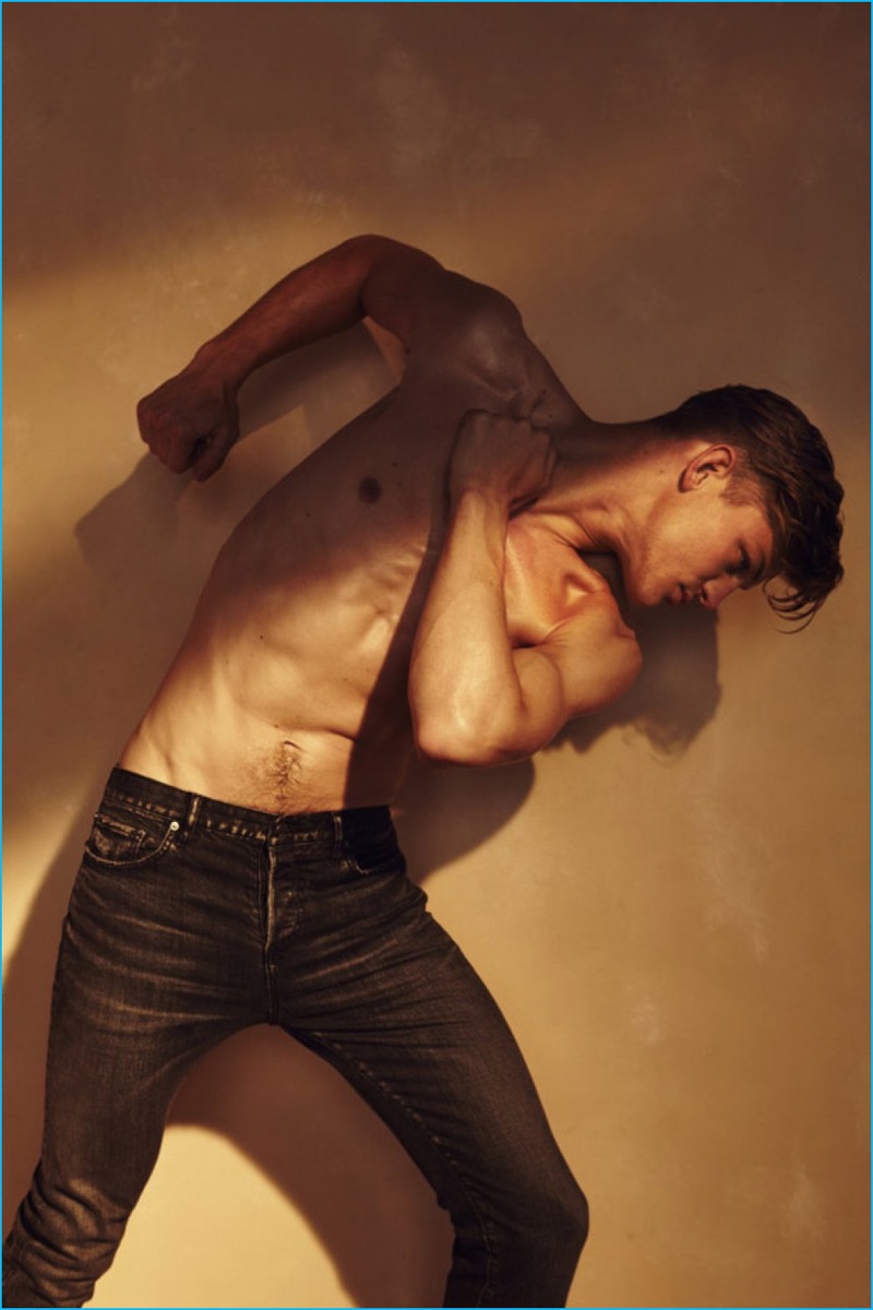 Sebastian Sauvé goes shirtless in a pair of BLK DNM's essential denim jeans.