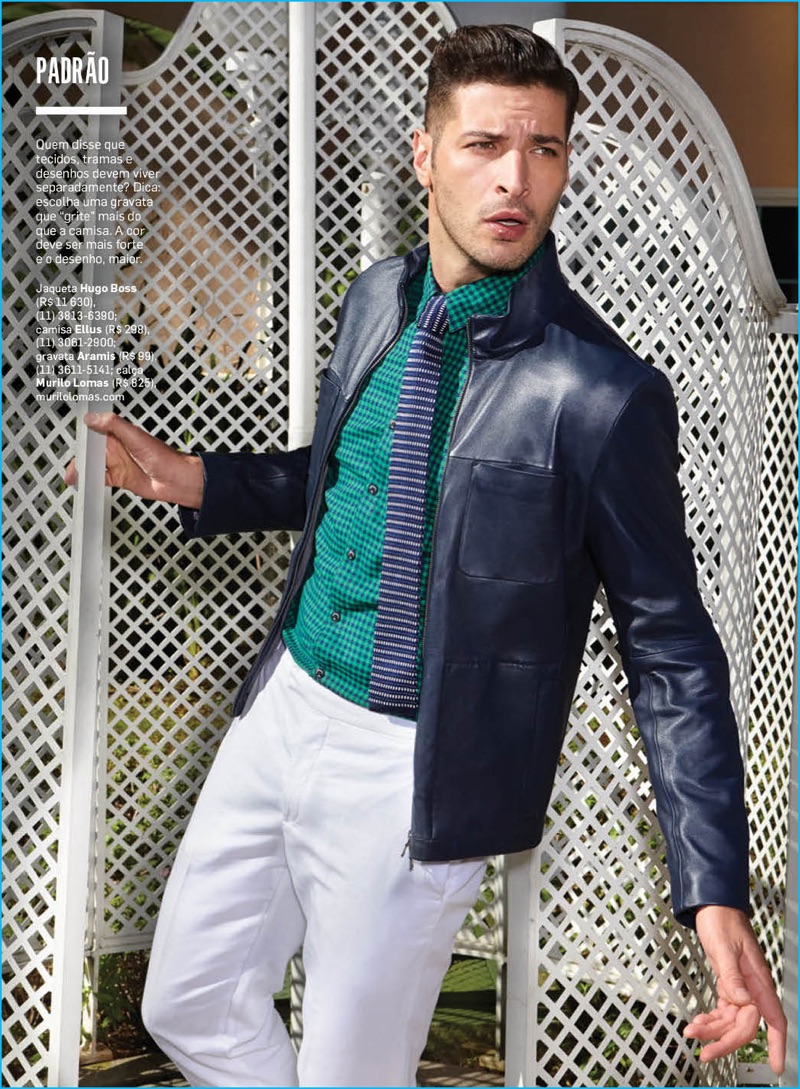 Leandro Lima invites the leather jacket into his smart wardrobe, wearing a style from Hugo Boss.