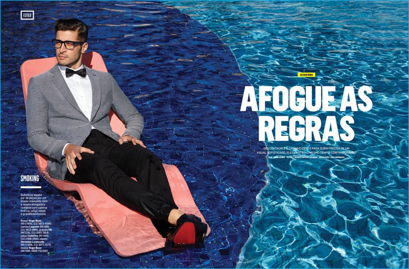 Leandro Lima takes to the pool in a sharp smoking jacket from German label Hugo Boss.