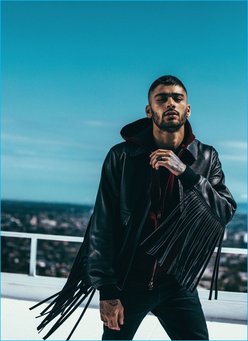 Zayn Malik rocks a fringe leather jacket for his Elle UK photo shoot.