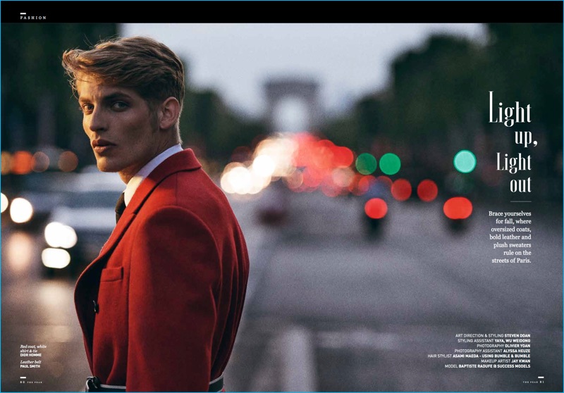 Baptiste Radufe photographed by Olivier Yoan in a red Dior Homme coat with a Paul Smith leather belt.
