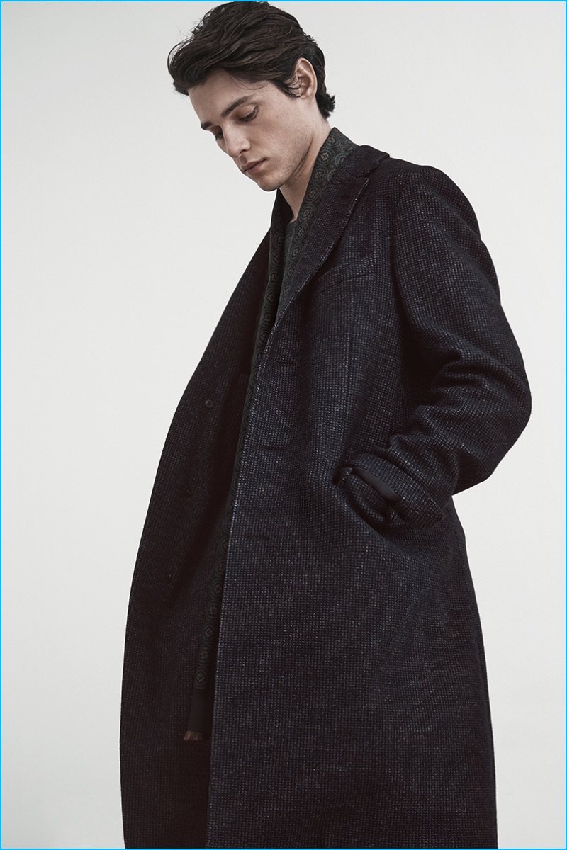 Luke Powell pictured in an oversized coat from Boglioli's pre-fall 2016 collection.