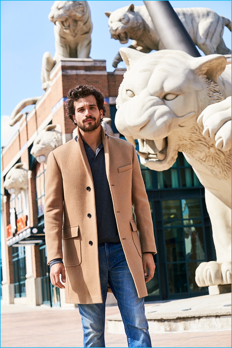 Paul Kelly dons a camel coat with distressed denim jeans from Bonobos' fall-winter 2016 collection.