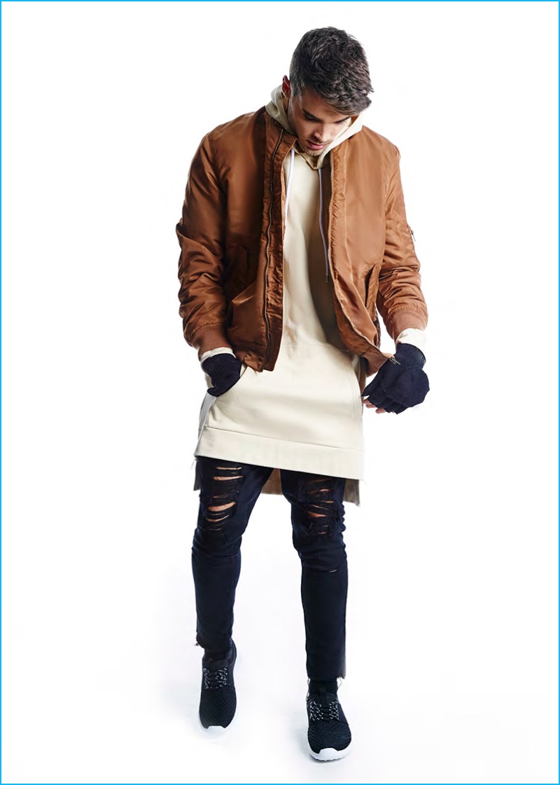 Josh Cuthbert pictured in a bomber jacket, ripped denim jeans, and a longline hooded sweatshirt from BoohooMAN's fall-winter 2016 collection. » BoohooMAN Delivers Active Styles for Fall Collection Josh Cuthbert pictured in a bomber jacket, ripped denim jeans, and a longline hooded sweatshirt from BoohooMAN's fall-winter 2016 collection.