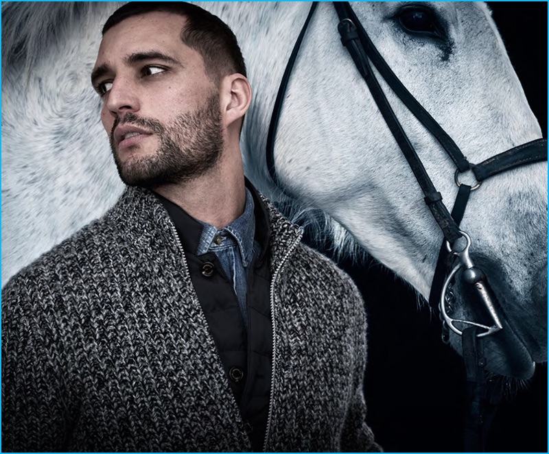 Thomaz de Oliveira poses with a horse for Brunello Cucinelli's fall-winter 2016 catalogue.