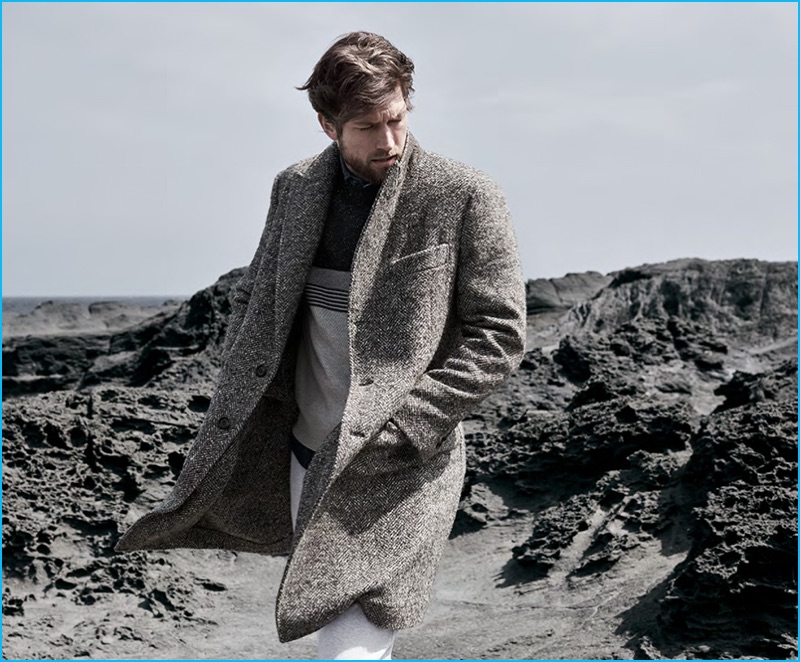 Jan Trojan takes to the outdoors in an essential coat from Brunello Cucinelli's fall-winter 2016 lineup.