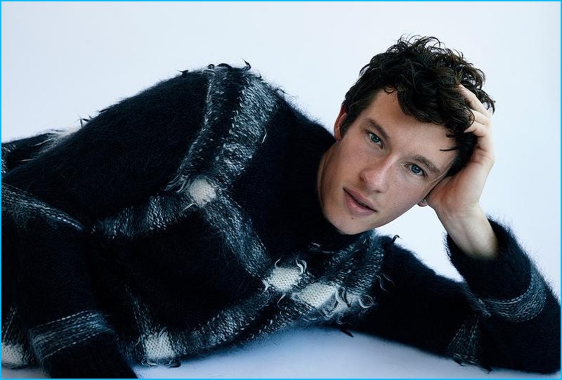 Callum Turner pictured in a Burberry sweater for his W magazine photo shoot.