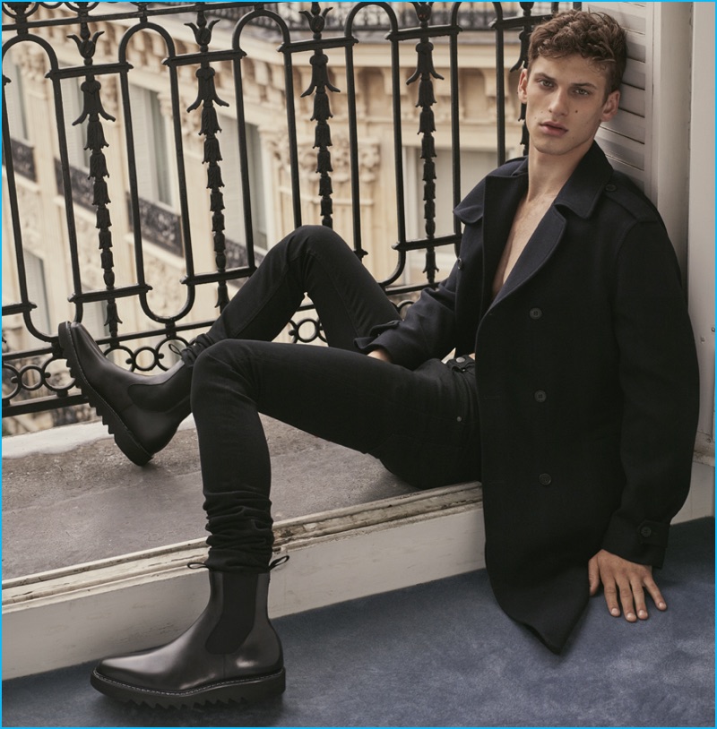 David Trulik wears all black for Cesare Paciotti's fall-winter 2016 campaign.