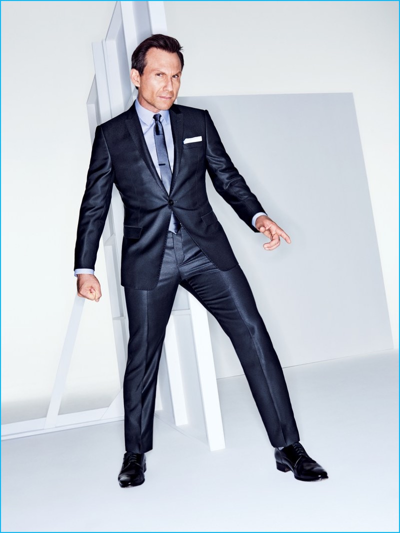 Christian Slater pictured in a sharp Emporio Armani suit for GQ.