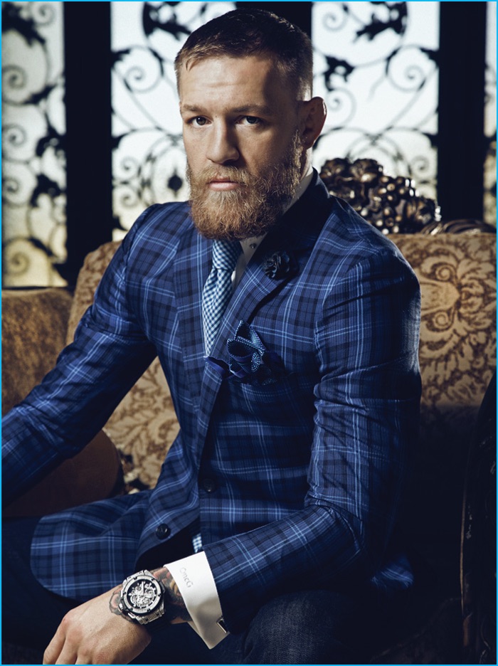 Conor McGregor pictured in a bespoke blue plaid suit from David August.