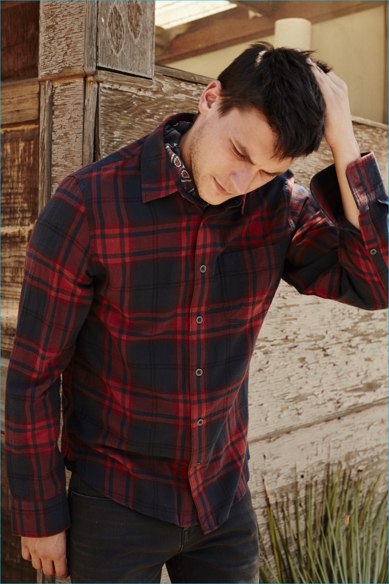 Miles Garber pictured in a plaid button down shirt from Current/Elliott's fall-winter 2016 men's collection.