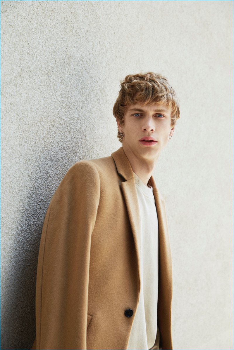 Robbi dons a camel coat from David Naman's fall-winter 2016 collection.