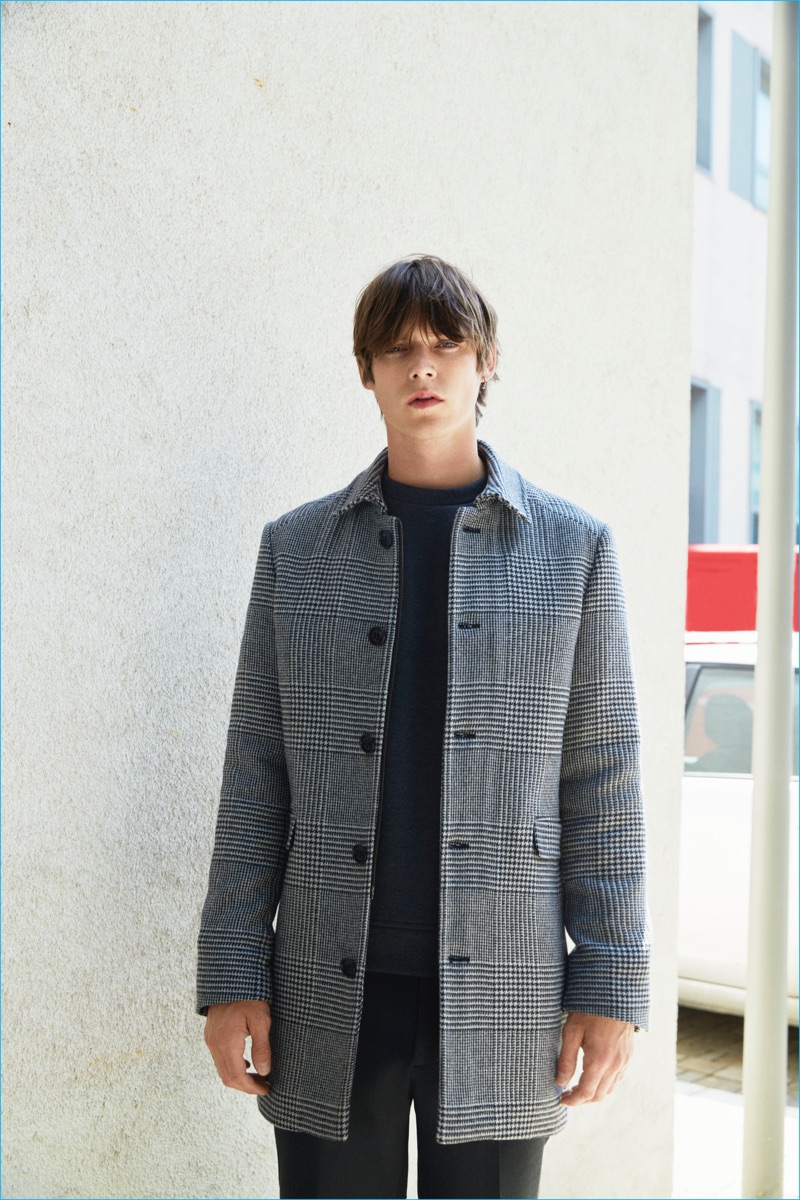 Conrad is front and center in a houndstooth single-breasted coat from David Naman's fall-winter 2016 collection.