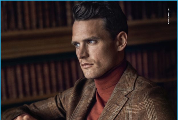 Starring in Dunhill's fall-winter 2016 campaign, Guy Robinson channels English country style in a plaid sport coat and turtleneck.