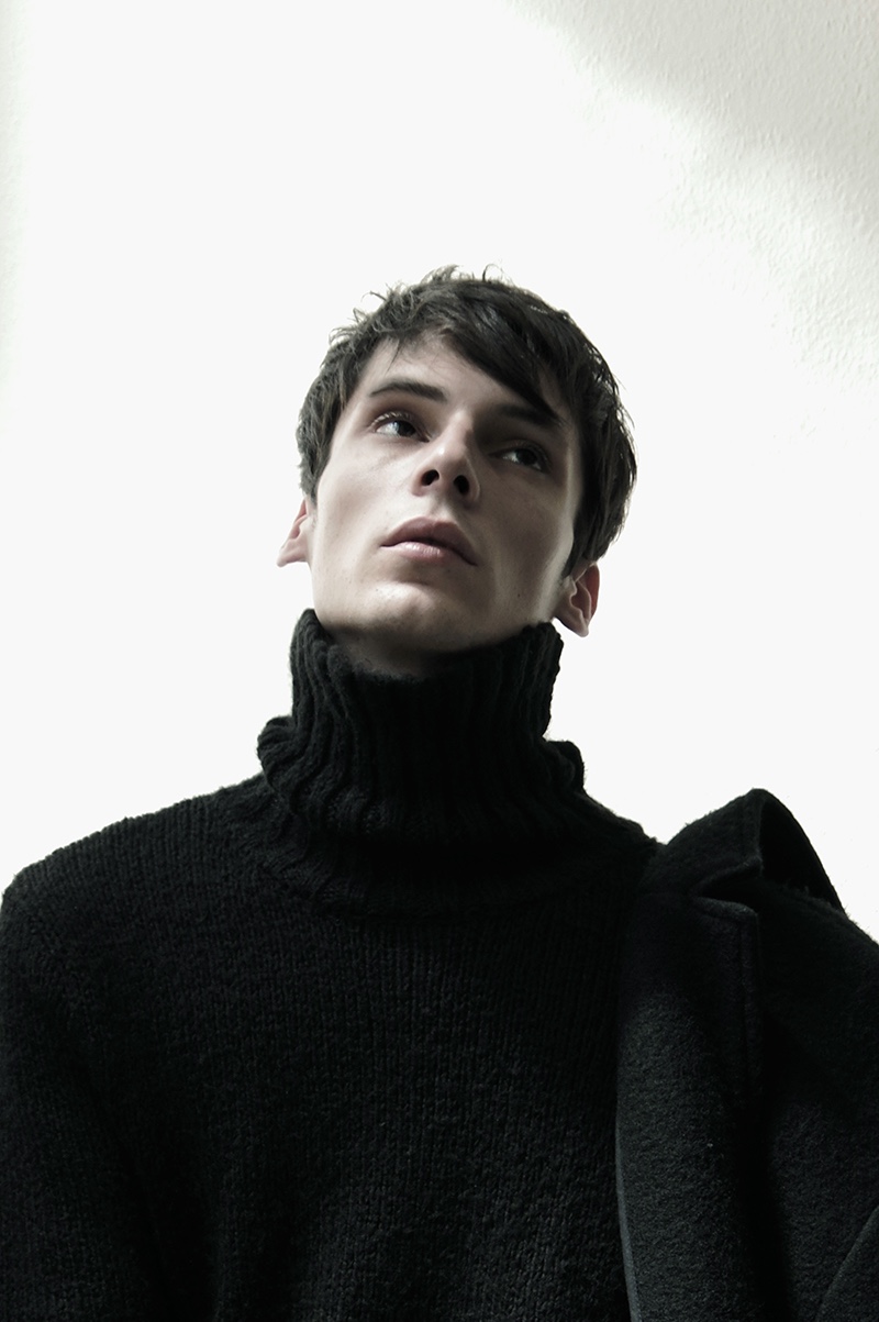 Lazare wears turtleneck sweater Diesel Black Gold and jacket Alexander McQueen.