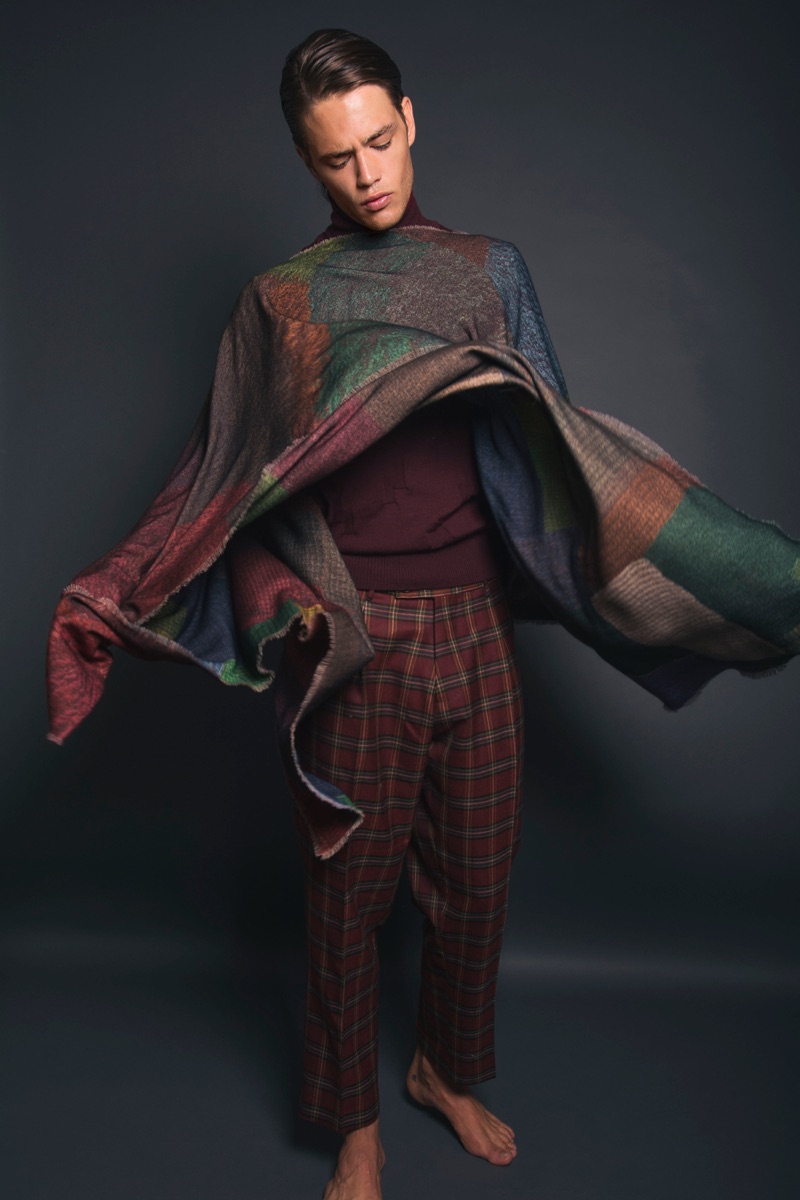 Raffaele wears poncho Pierre-Louis Mascia, sweater Pence 1979, and trousers Berwich.