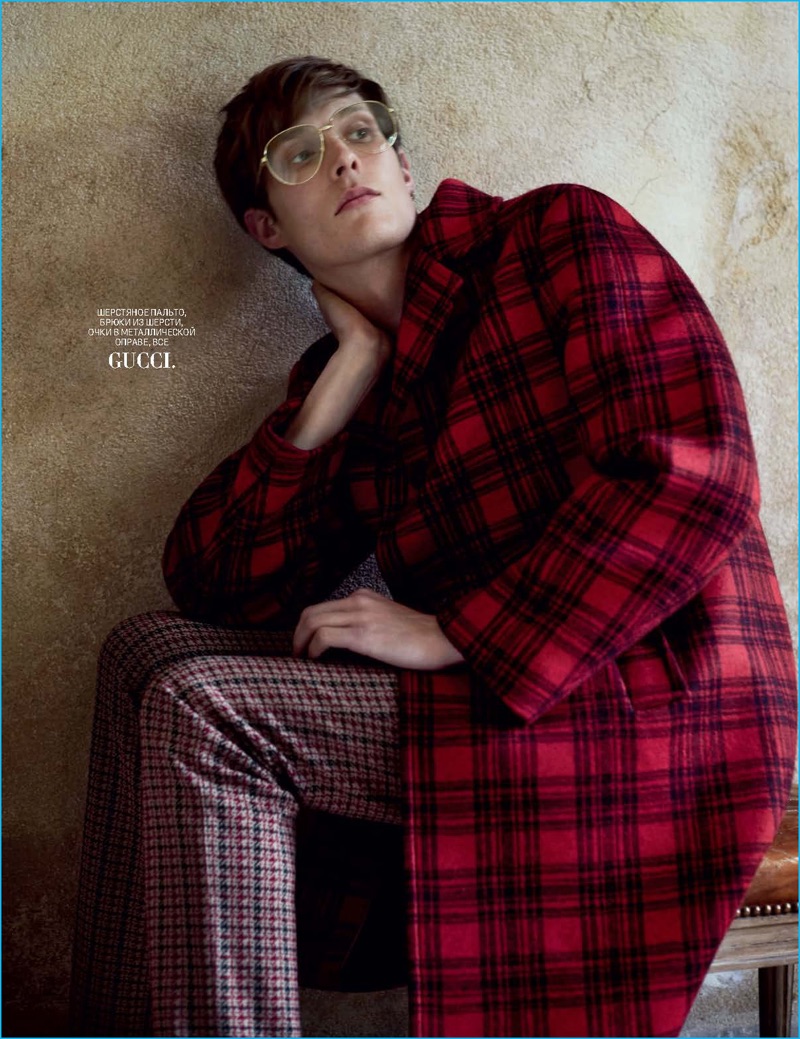 Felix Gesnouin dons a red check coat from Gucci for the pages of GQ Russia.