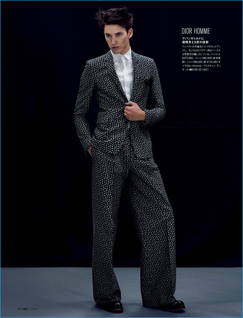 Dominik Bauer pulls off a wide-leg trousers and sharp blazer from Dior Homme for GQ Japan.