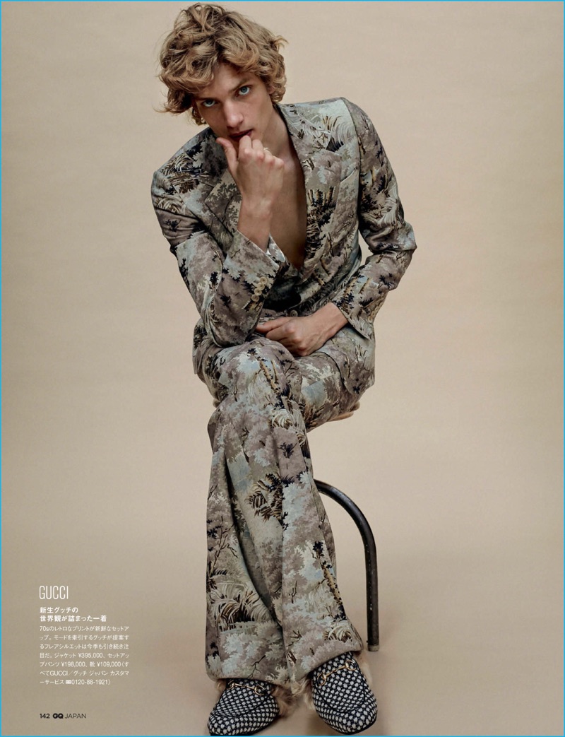 Paul Boche dons a dandy print suit from Gucci for GQ Japan.