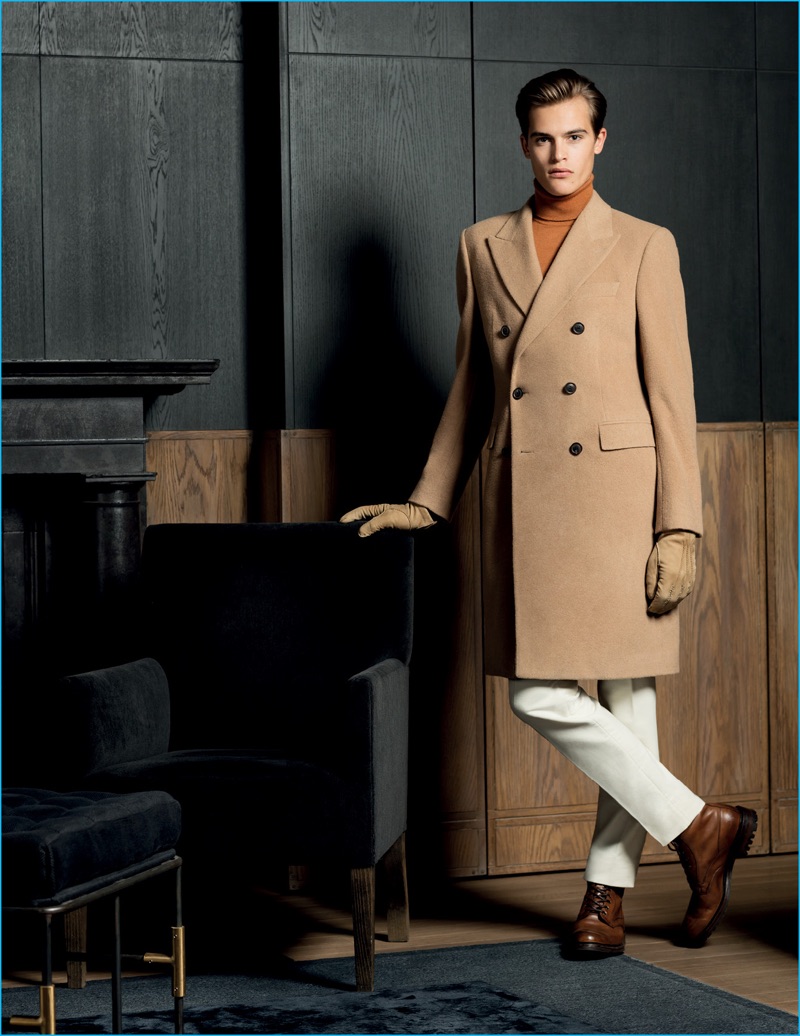 Parker van Noord dons a camel double-breasted coat for Gieves & Hawkes' fall-winter 2016 campaign.