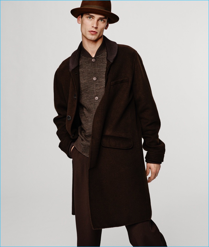 Arthur Gosse charms in an oversized single-breasted coat from Giorgio Armani's fall-winter 2016 collection.