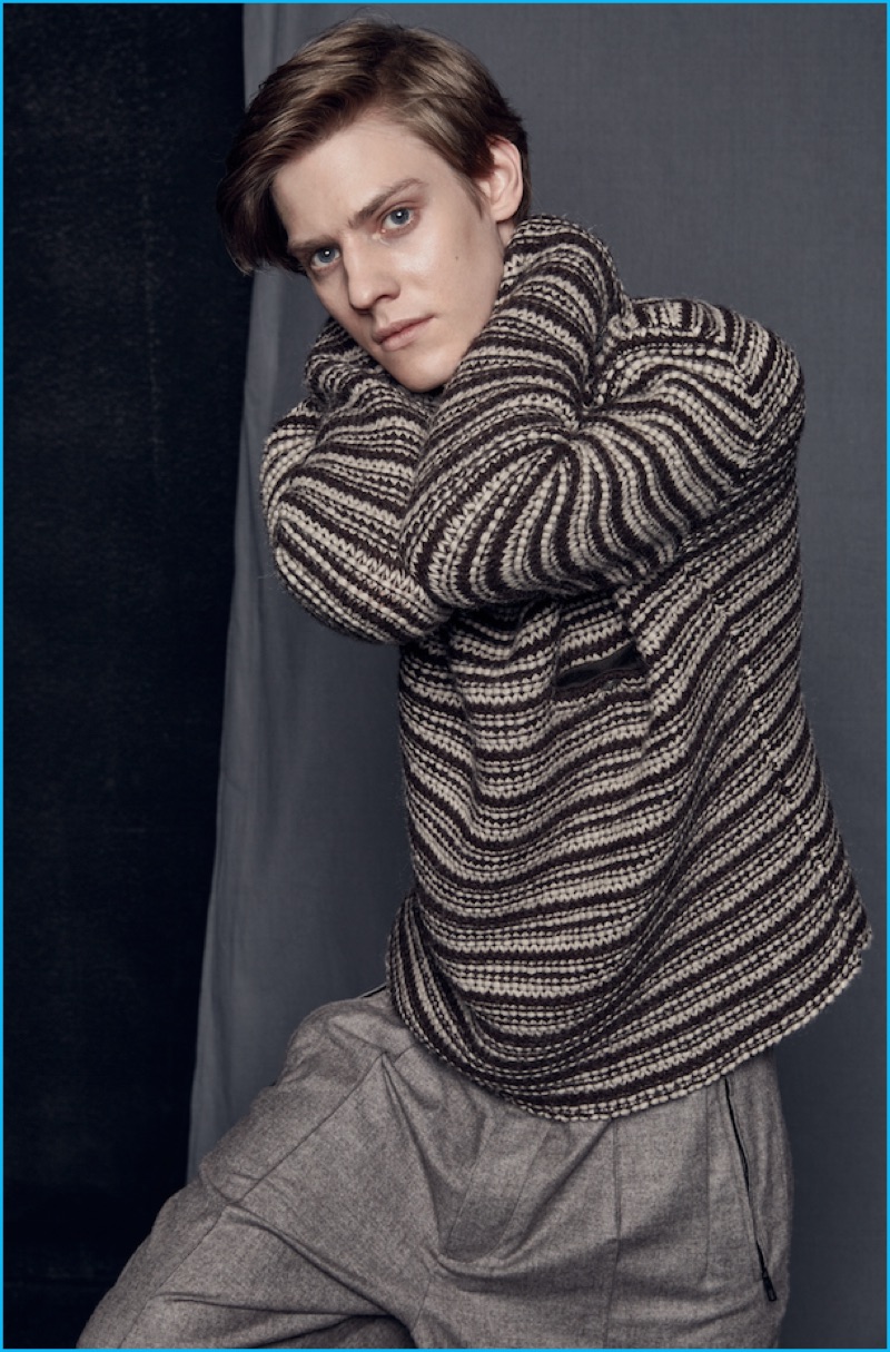 Pavel Tabakov wears a patterned knit from Giorgio Armani for GQ Russia.