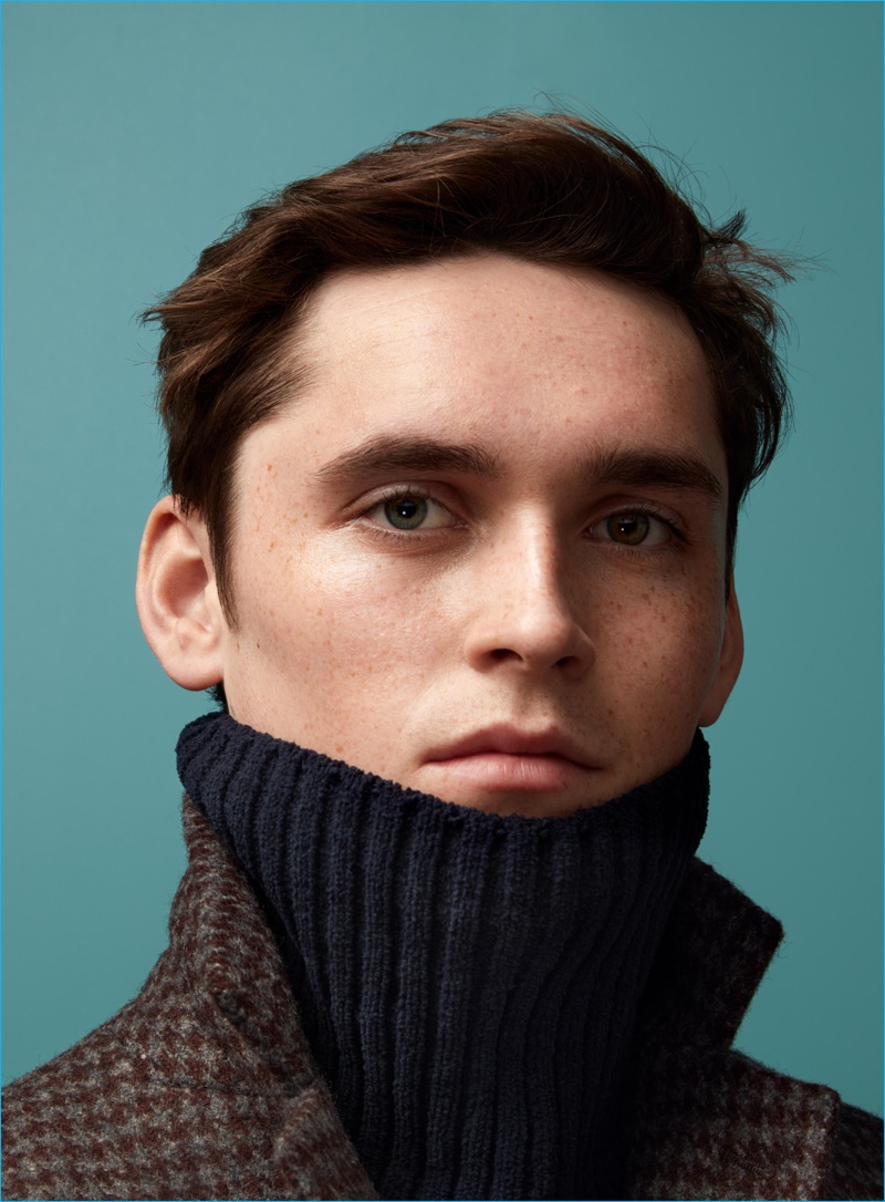 Anders Hayward models a turtleneck sweater and coat from H&M's fall-winter 2016 Studio collection.