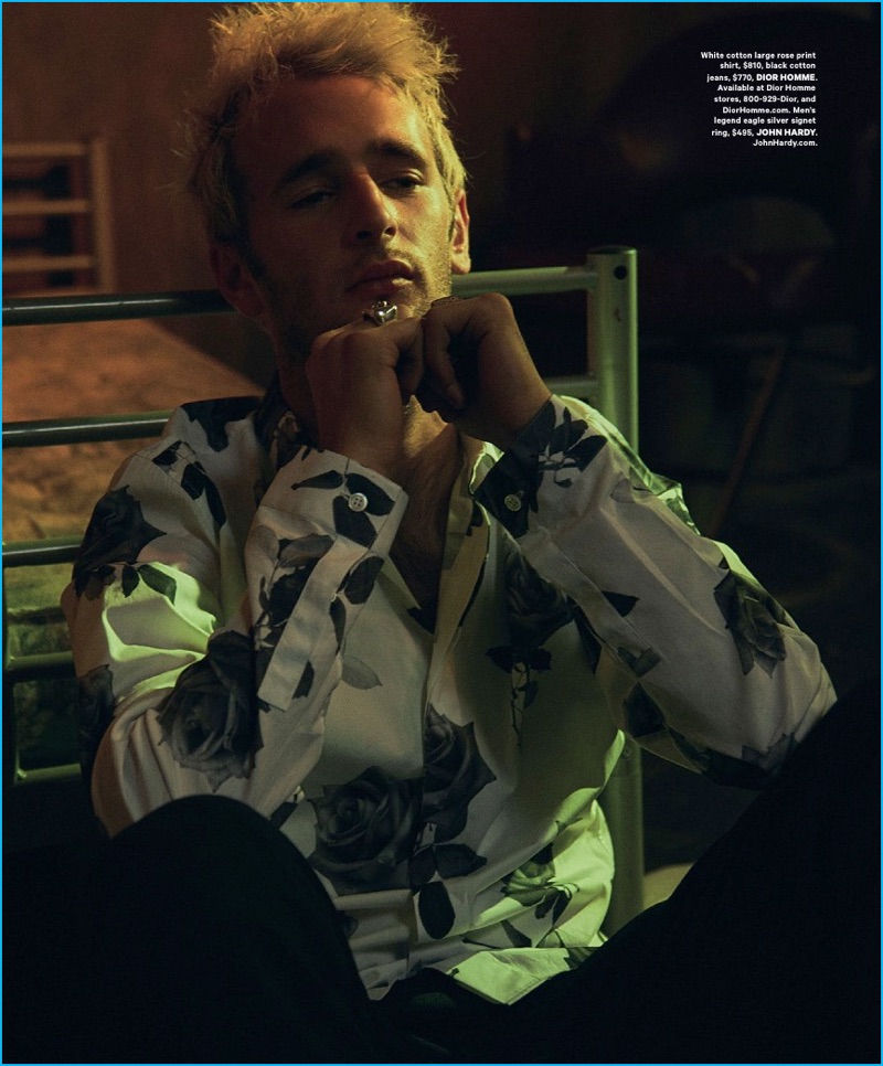 Hopper Penn dons a rose print shirt from Parisian label Dior Homme.