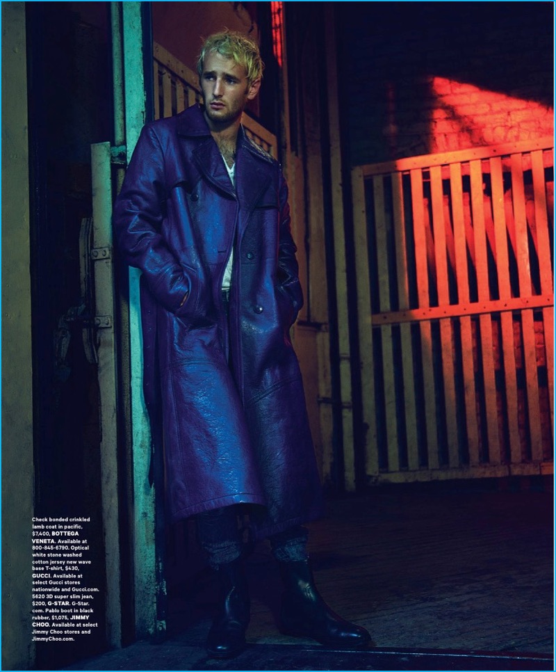 Hopper Penn pictured in a long blue Bottega Veneta leather coat.